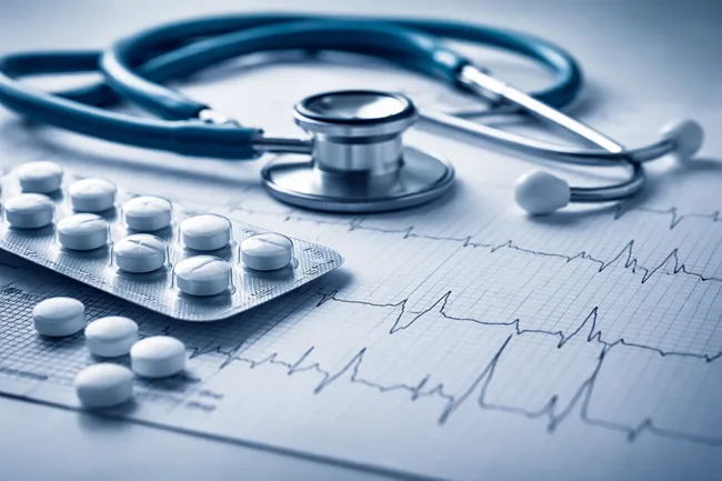 Representative image showing cardiac monitoring and medication, relevant to Thryv Therapeutics’ Wave II trial of THRV-1268 for Long QT Syndrome Type 2 (LQTS2), where SGK1 inhibition aims to directly address QT prolongation.
