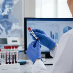 Representative image: A laboratory professional reviews STI test samples and public health data as Europe’s record rise in gonorrhoea, syphilis and chlamydia cases puts diagnostics, prevention and antimicrobial resistance strategies under renewed scrutiny.