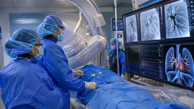 Representative image: Clinicians perform a catheter-based pulmonary embolism thrombectomy, as Imperative Care’s SYMPHONY-PE analysis examines whether earlier intervention can improve heart recovery.