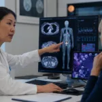 Representative image of an oncologist reviewing melanoma imaging and molecular cancer data, reflecting Natera’s Signatera collaboration with Diakonos Oncology and the growing role of ctDNA monitoring in refractory melanoma immunotherapy trials.